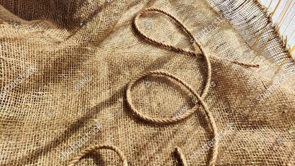 Burlap cloth with a loose loop of twine